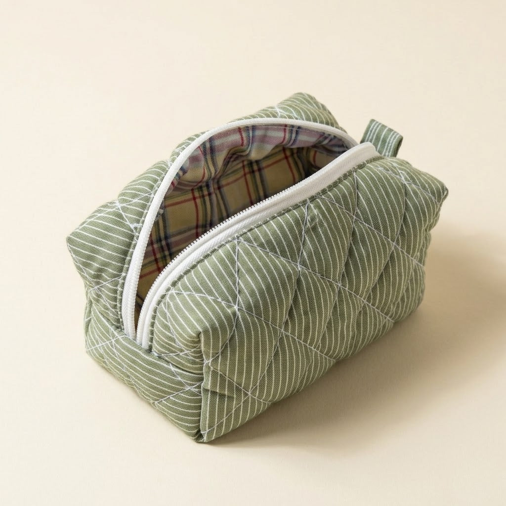 The Essential — Matcha Latte pouch, open to show the checked lining